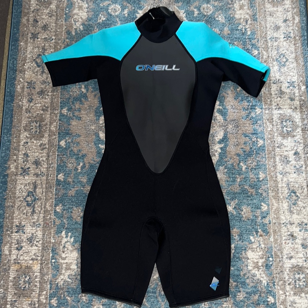 New With Taq O’Neill Wetsuit Black/Turquoise Color